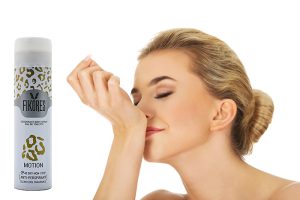 woman smelling perfume